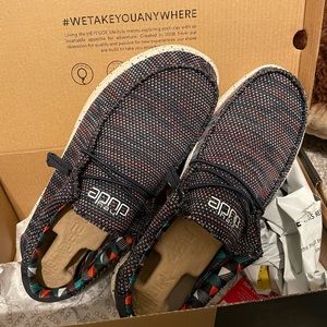 Brand new, NEVER out of the box Hey Dude mens shoes.